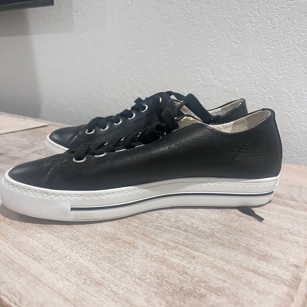 Ecco black leather street sneakers.